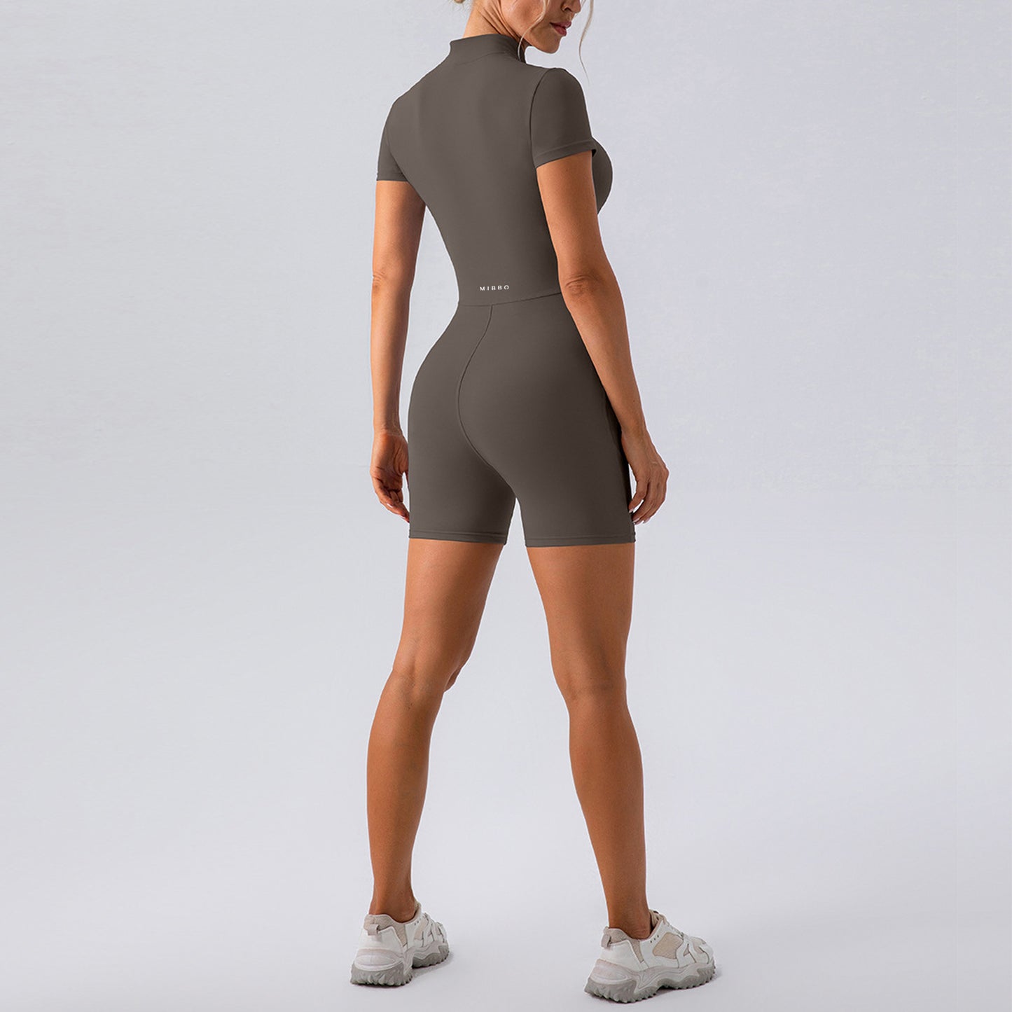 Tutina Sportiva Modellante Donna – VITA Zip Jumpsuit Tortora | MIBBO